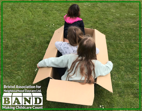Funding pages - 3 girls sit in a cardboard box as if they were setting out on adventure in a sailing boat 